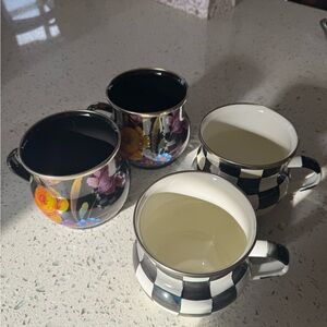 MacKenzie-Childs Black and White Checkered Mugs with Floral Design